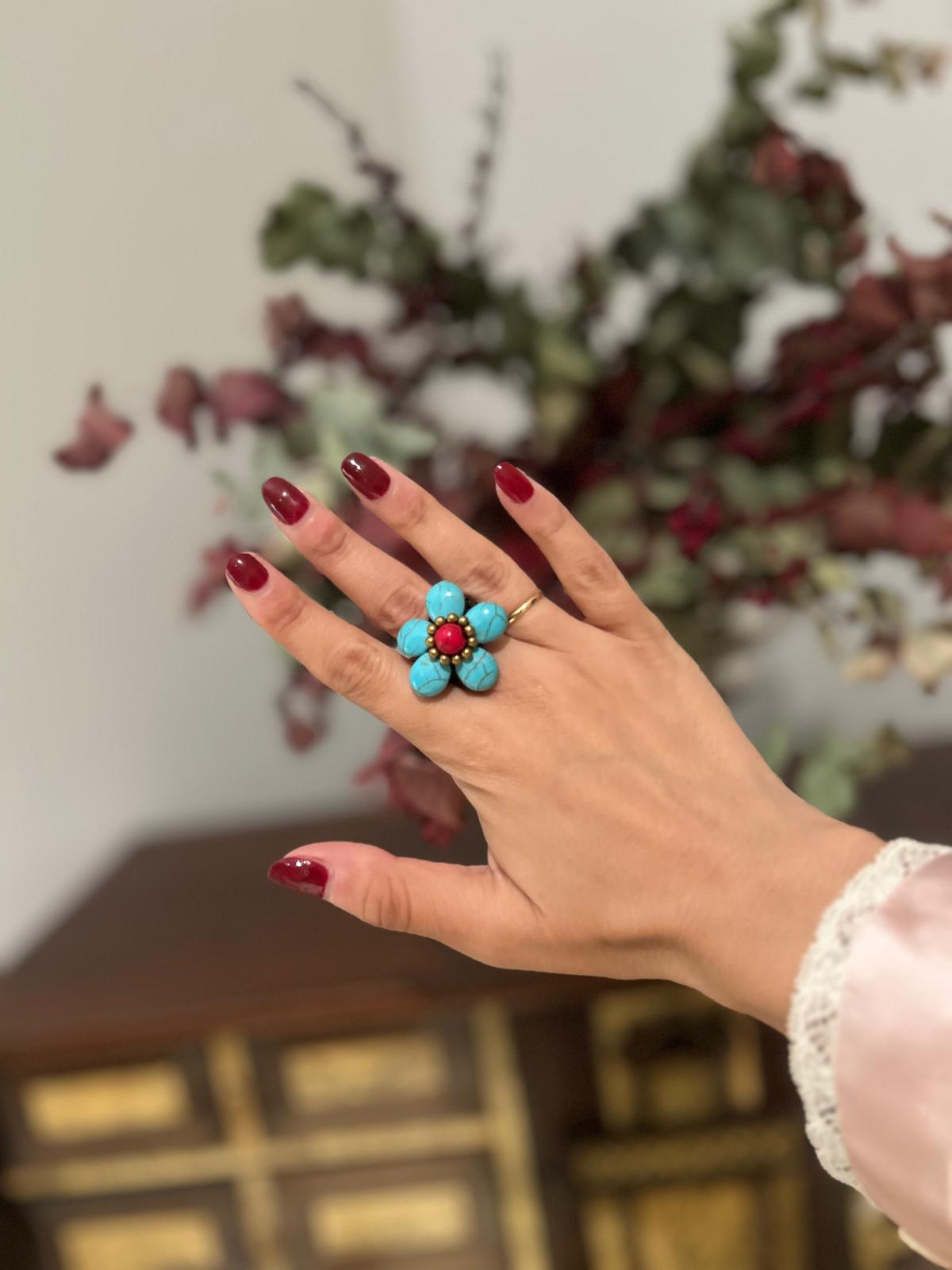 Anillo de semillas turquesa